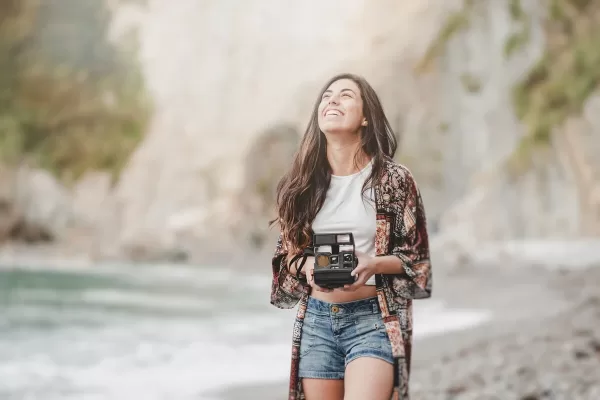 CVS Disposable Camera: A Hassle-Free Way To Take Great Photos On The Go lady with CVS Disposable Camera